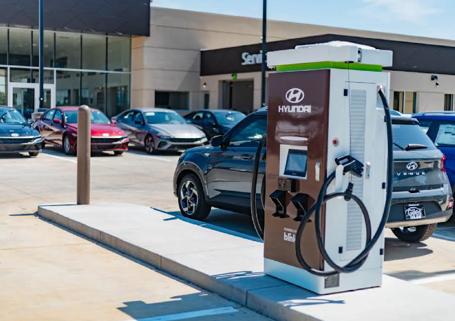 hyundai-image-ev-charger a Hyundai dealership with an ev charger out front